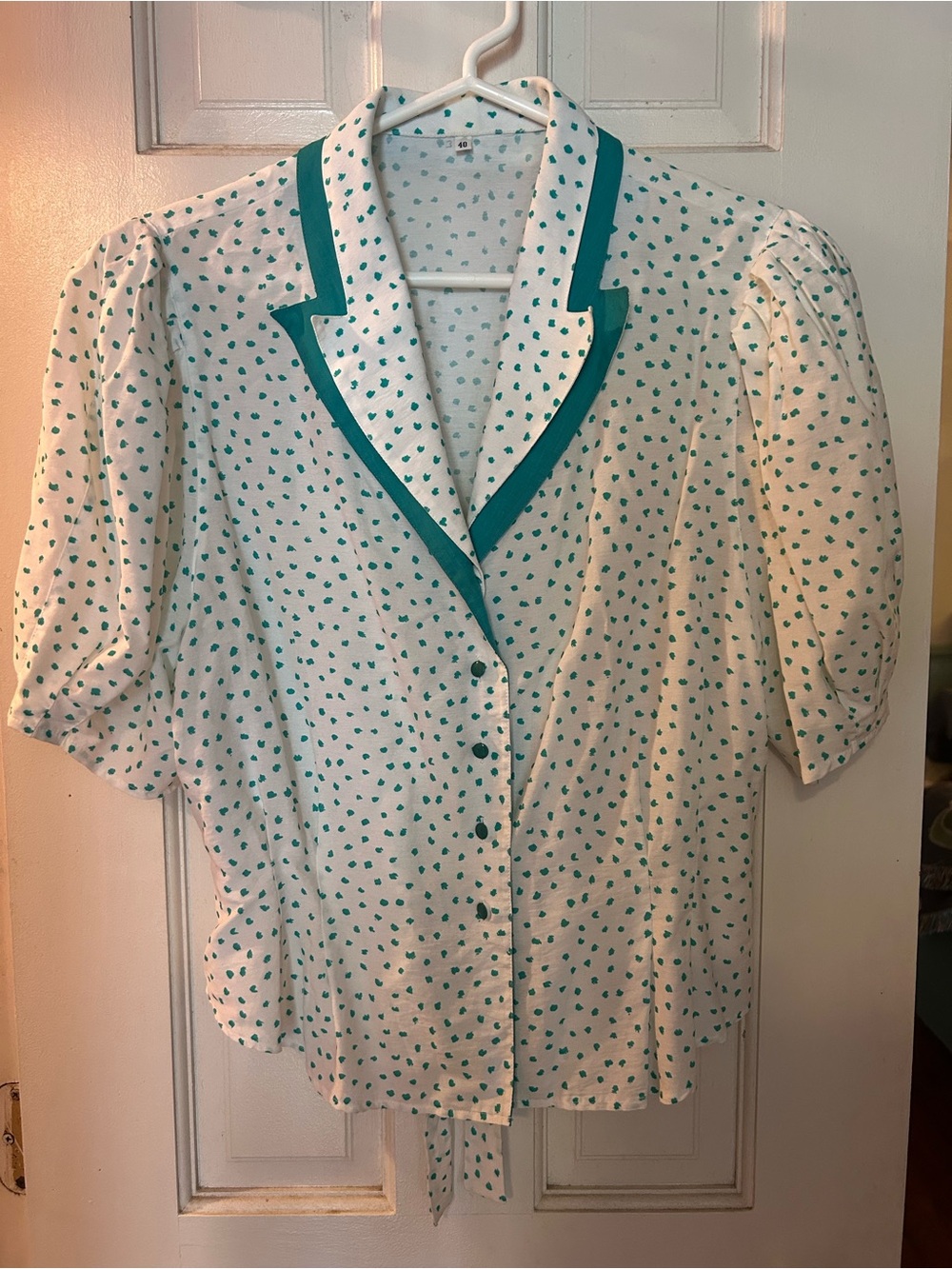 white & green patterned blouse